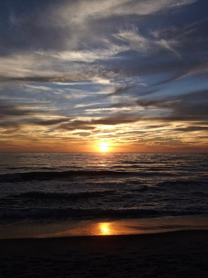 Sunset Over The Ocean Photograph by Kathy Ozzard Chism