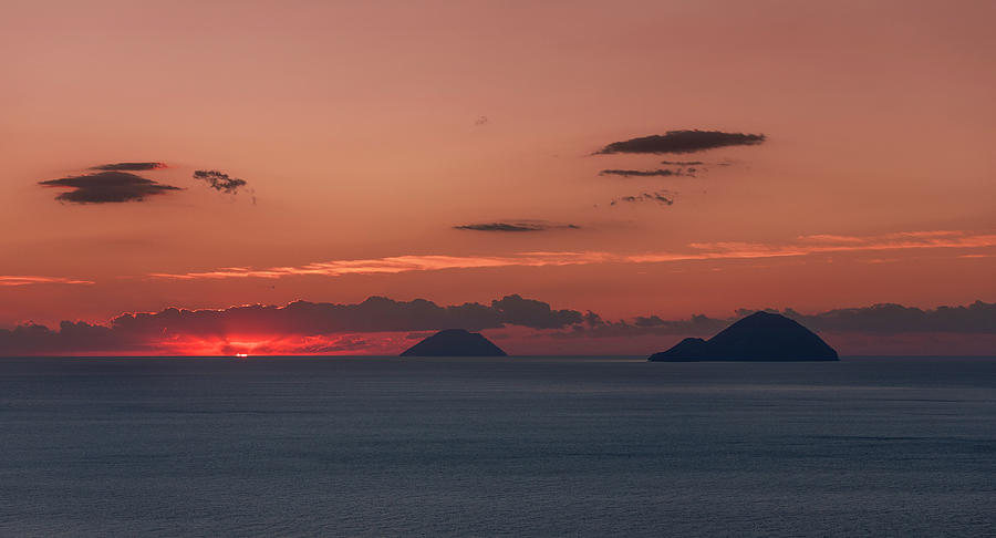 Sunset Over The Sea With Alicudi And Filicudi Volcanic Islands, Sicily Italy Photograph by Bastian Linder