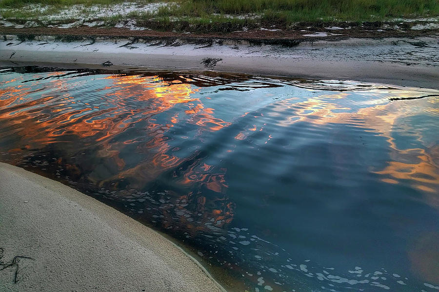 Sunset Reflected in Mullet Creek Photograph by Gerald Grow