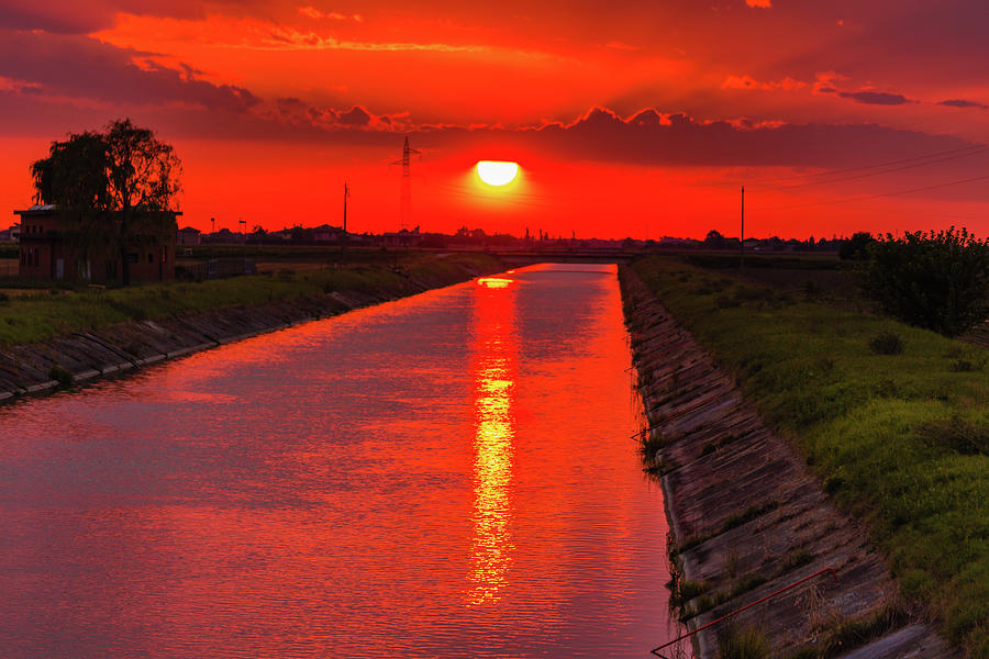 Sunset Sky On Irrigation Channel Photograph by Vivida Photo PC