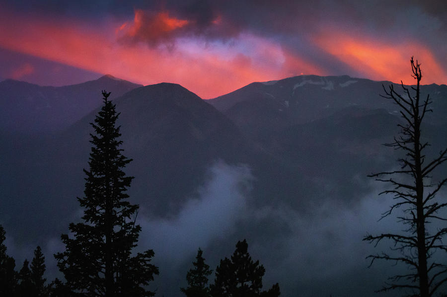 Sunset Storms Over The Rockies Photograph by John De Bord
