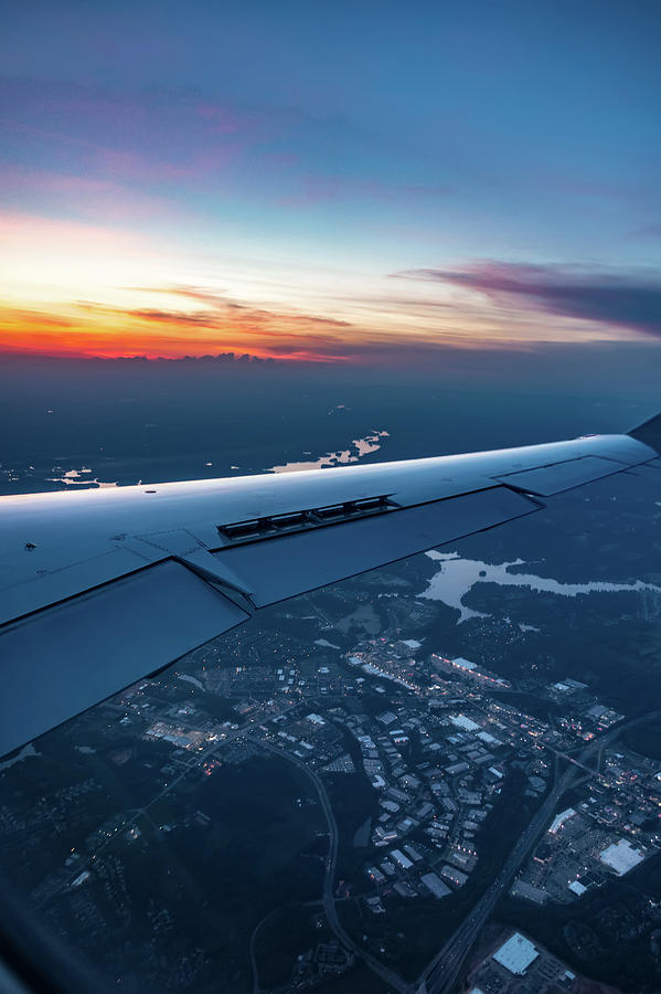 Sunset view from airplane window Photograph by Alex Grichenko