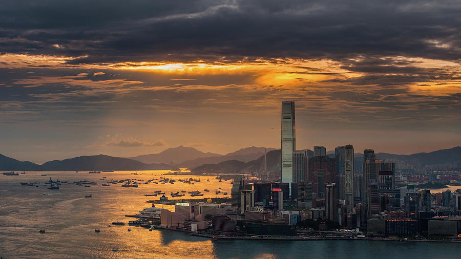 Sunset View Of Tsim Sha Tsui District Photograph by Coolbiere Photograph