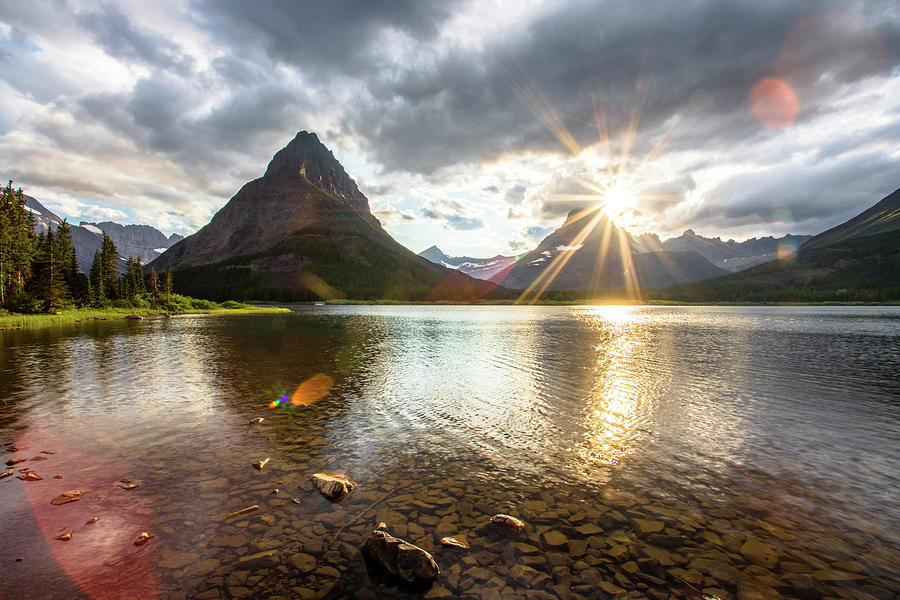 Sunsets over Swiftcurrent Lake Photograph by Andrew Lillibridge - Fine ...