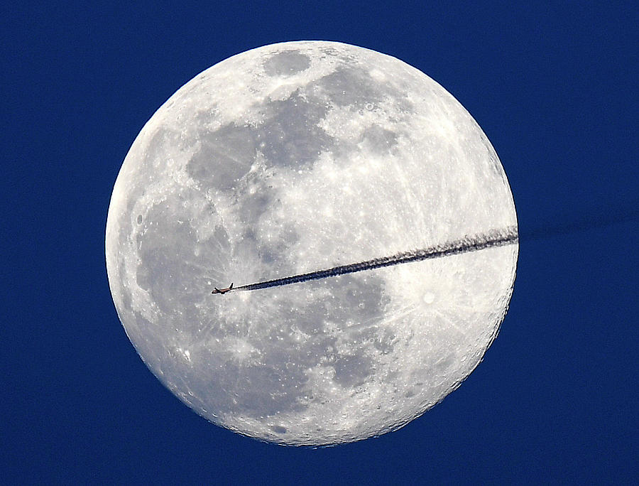 Super Moon-worm Moon Photograph by The Washington Post