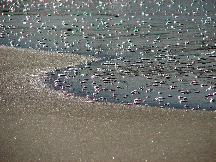 Surf Bubbles On The Sand Photograph by Photo By Bob Travis
