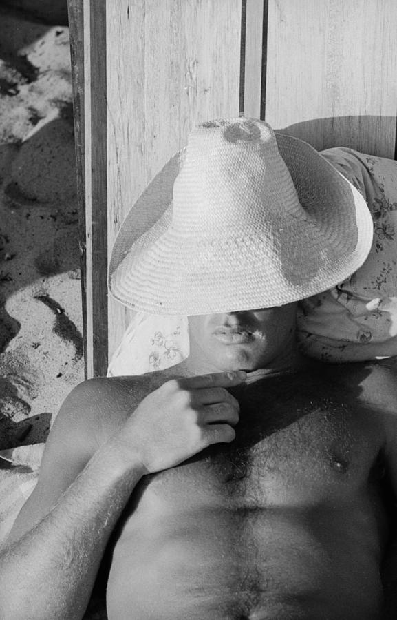Surfer Catching Some Sleep Photograph by Loomis Dean Surfer Catching Some Sleep Photograph by Loomis Dean