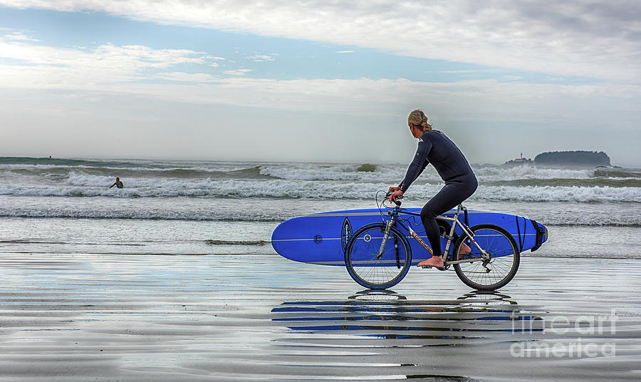 Surfer on Bike by Mauro Celotti Surfer on Bike by Mauro Celotti