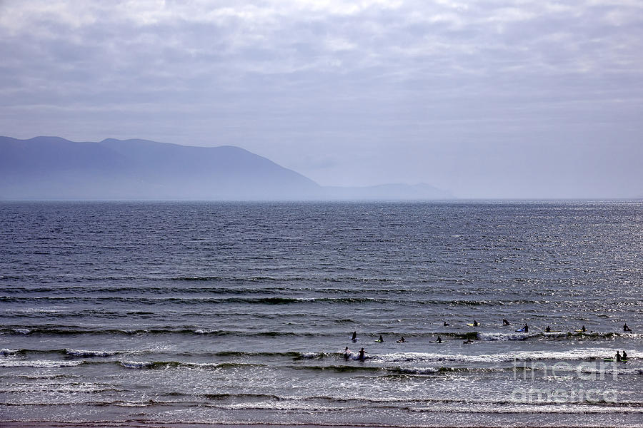 Beach Photograph - Surfers at Inch beach by Olivier Le Queinec