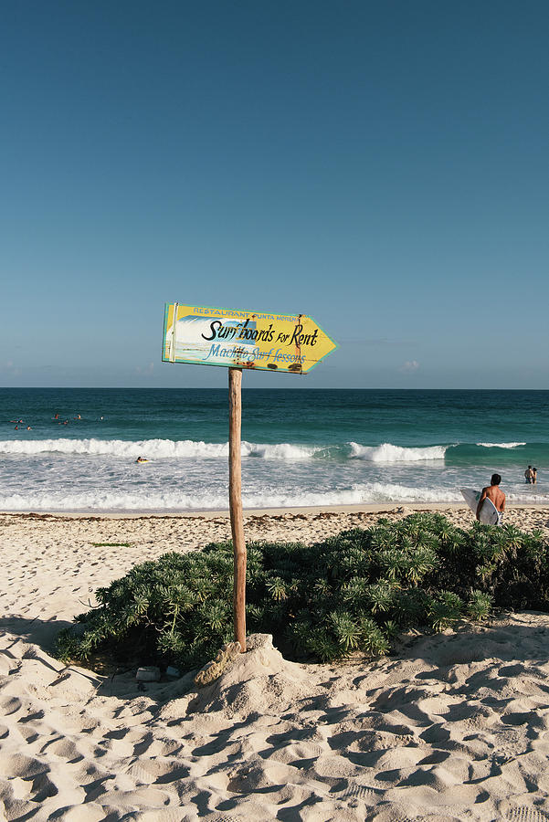 Surfers Head To The Beach At Punta Morena On Cozumel Photograph by ...