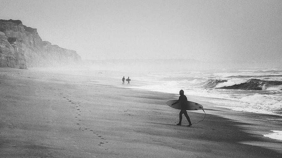 Surfers Photograph by Pawel Kado