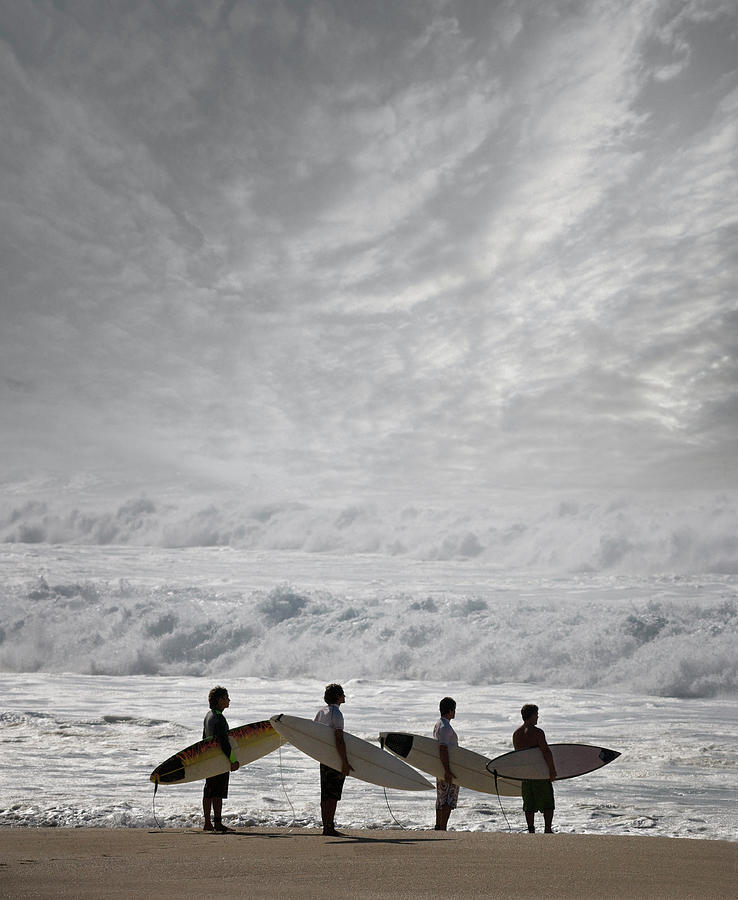 Surfers With Surfboard On Beach Photograph by Ed Freeman