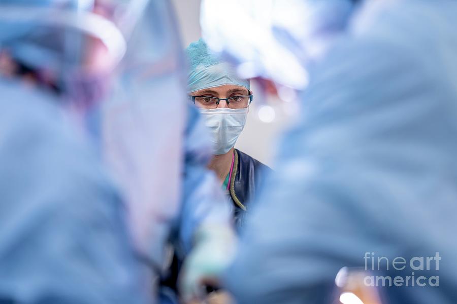 Surgeon Observing An Operation On The Spine Photograph By Jim Varney Science Photo Library