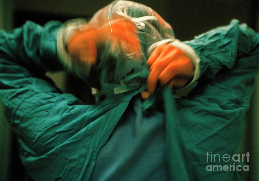 Surgeon Removes Gown Photograph By Michael Donne Science Photo Library