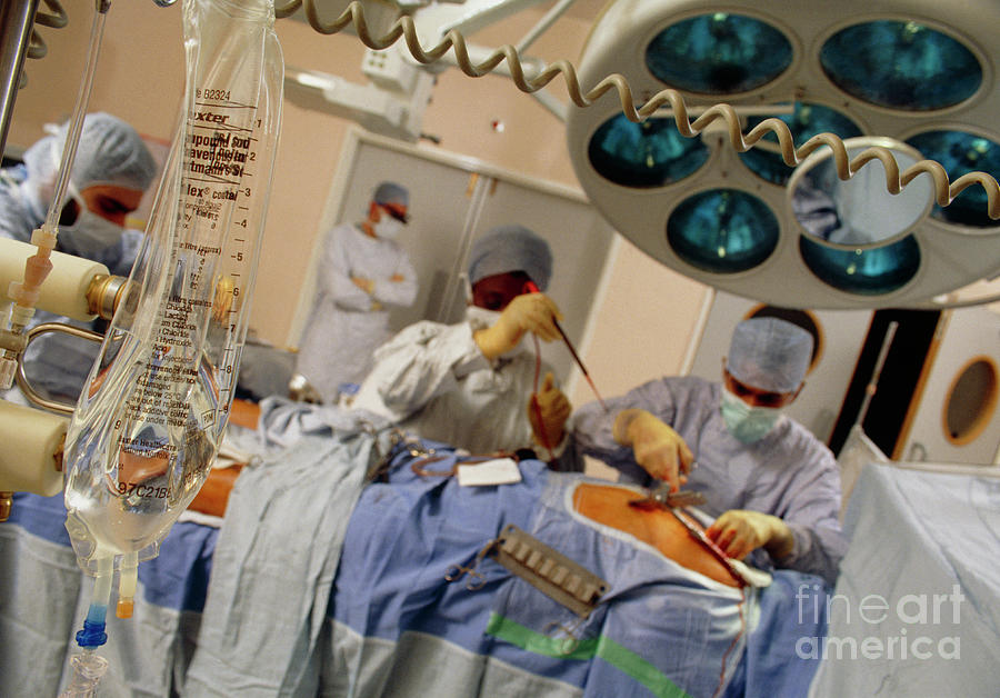 Surgeons Perform Quadruple Bypass Heart Operation Photograph by Michael ...