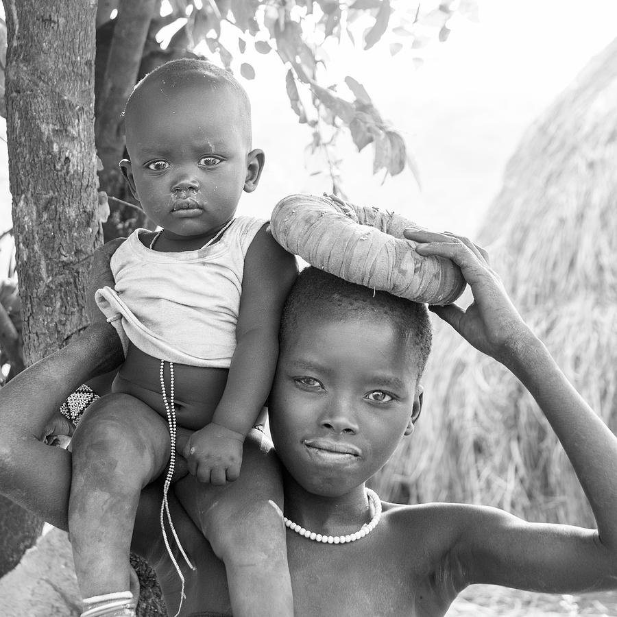 Suri girl and baby Photograph by Mache Del Campo
