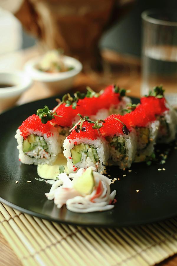 Sushi Rolls With Cucumber And Flying Fish Roe Photograph by Kuzmin5d
