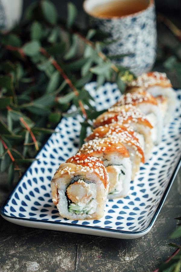 Sushi Rolls With Eel, Tempura Prawns, Fresh Cheese, And Cucumbers Photograph by Kate Prihodko