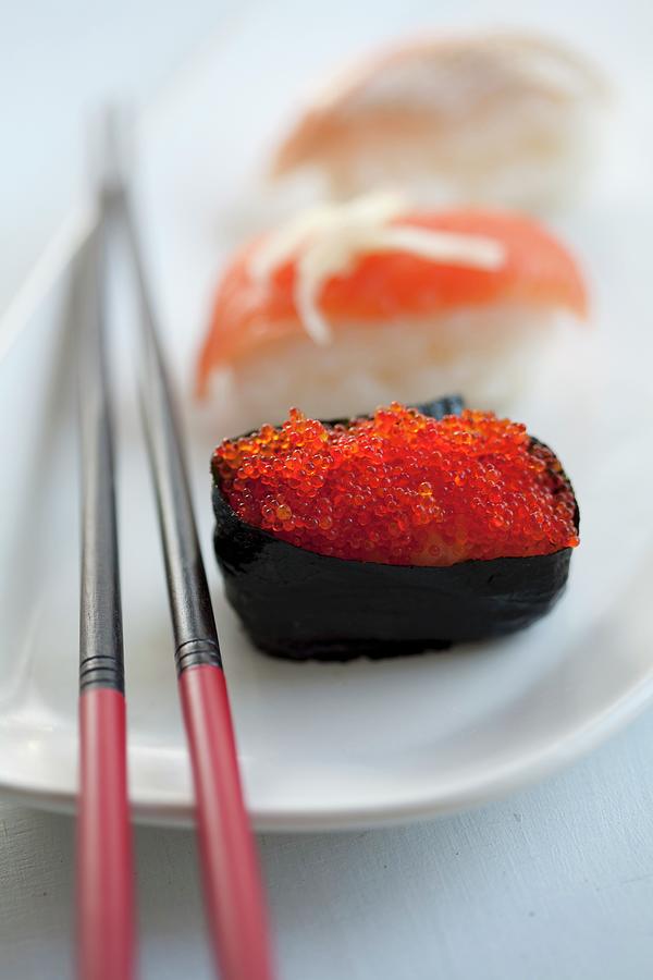 Sushi With Salmon Caviar And Salmon Photograph by Martina Schindler
