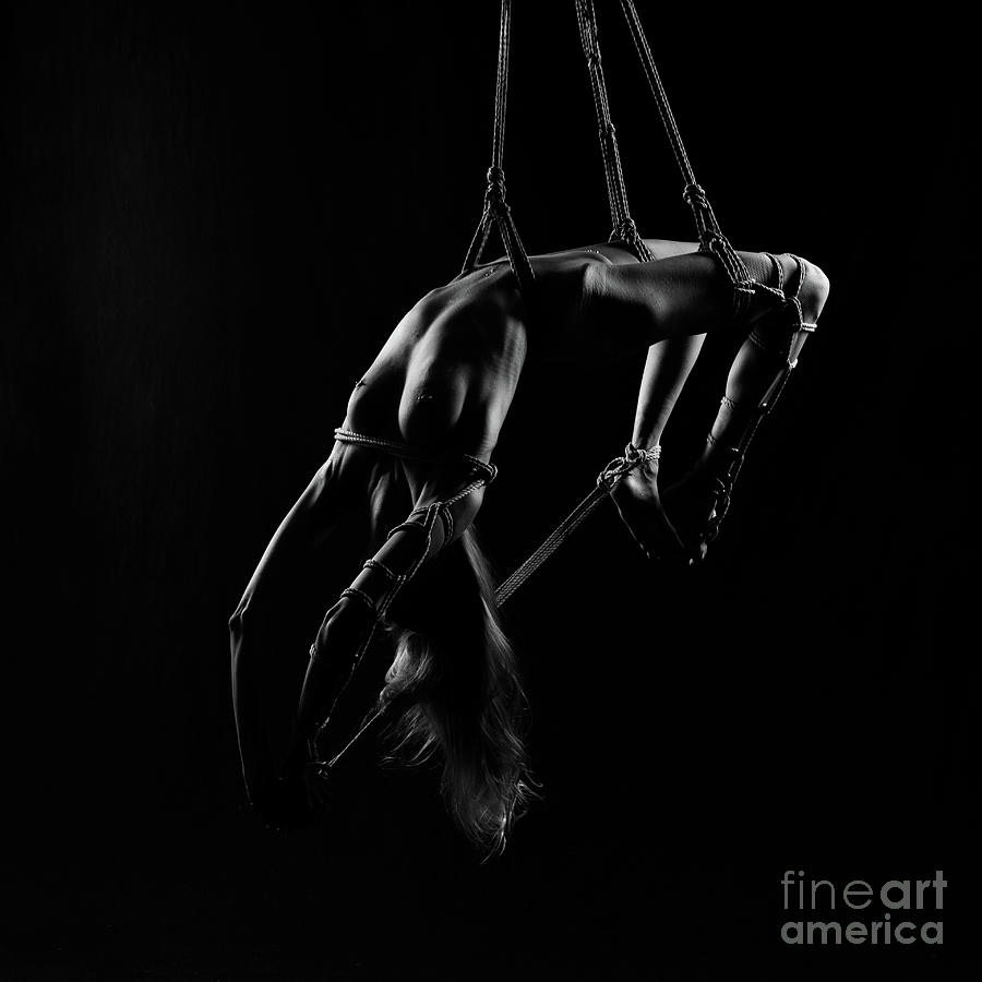 Celebrity Photograph - Suspension woman in rope - side 2 by Performance Image Europe