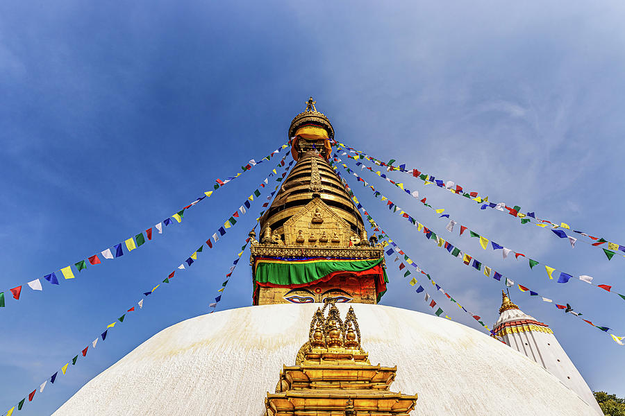 Swayambhunath Stupa located on the top of the hill and overlooki Photograph by Marek Poplawski