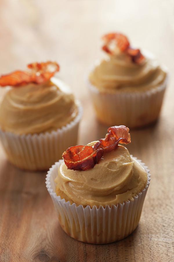 Sweet And Salty Cupcakes With Maple Syrup Cream And Bacon Photograph by Laurange