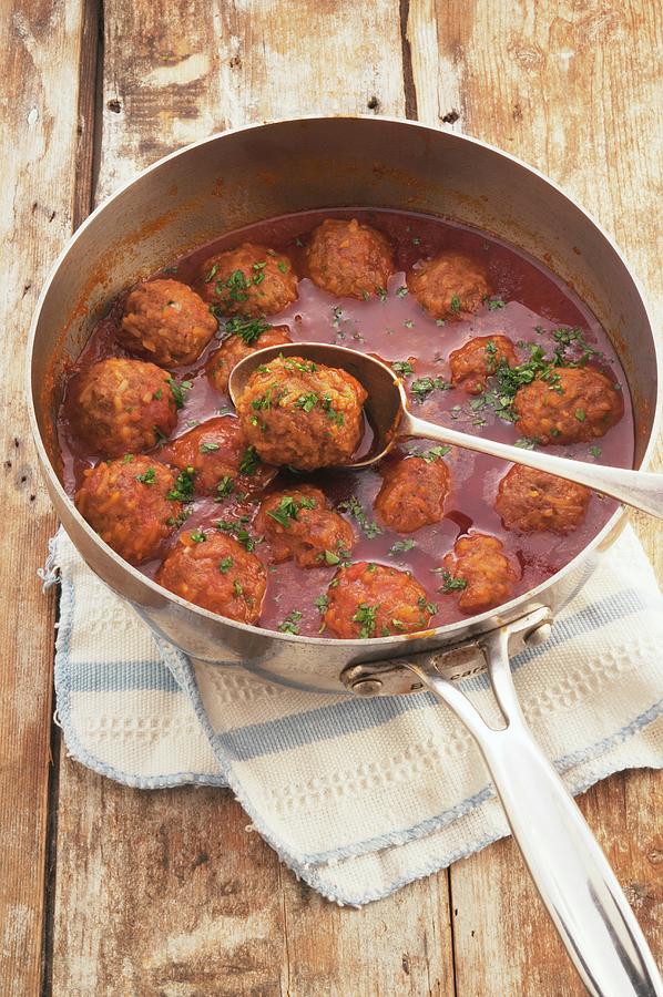 Sweet And Sour Meatballs In A Pan Photograph by John Hay