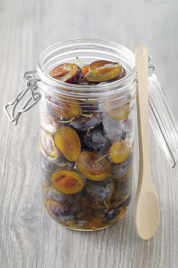 Sweet-and-sour Preserved Damsons In A Jar Photograph by Jean-christophe Riou