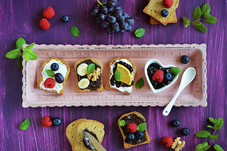 Sweet Canapes Made Of Rusk With Fresh Fruits And Mint Photograph by Mariola Streim