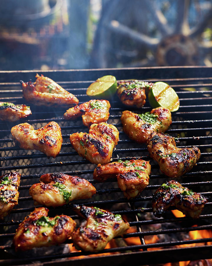 Sweet Chilli Chicken Wings On Bbq Photograph by James Lee
