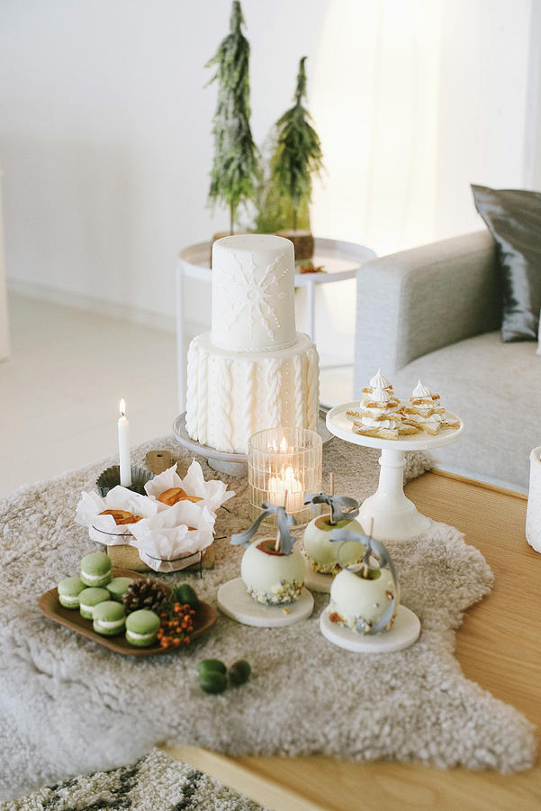 Sweet Pastries And Christmas Decorations On Fur Blanket On Table Photograph by Katja Heil