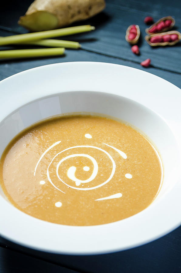 Sweet Peanut Cream Soup Garnished With Double Cream In A White Plate Photograph by Giulia Verdinelli Photography