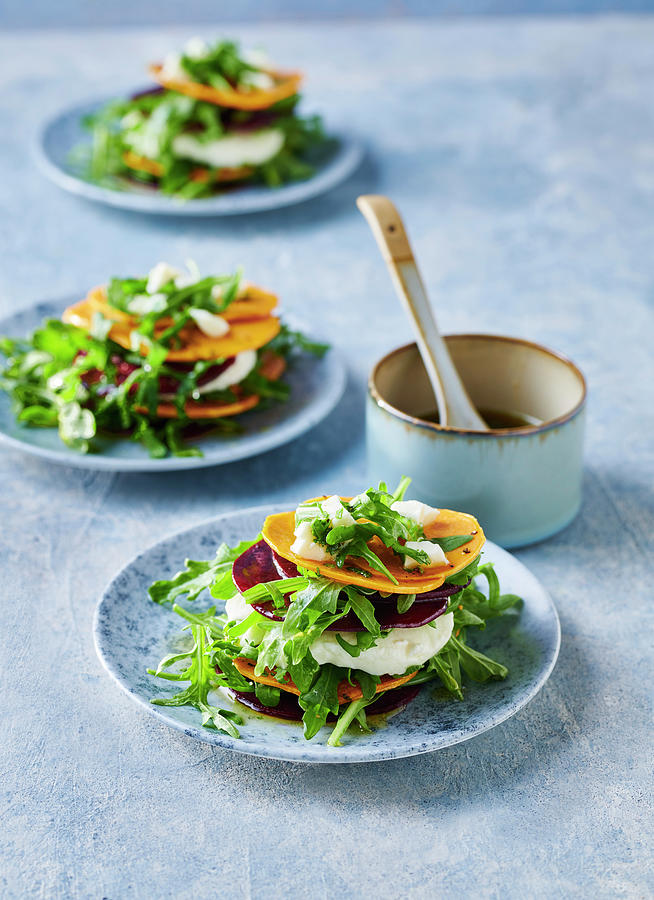 Sweet Potato And Beetroot Stacks With Buffalo Mozzarella And Rocket Photograph by Stefan Schulte-ladbeck