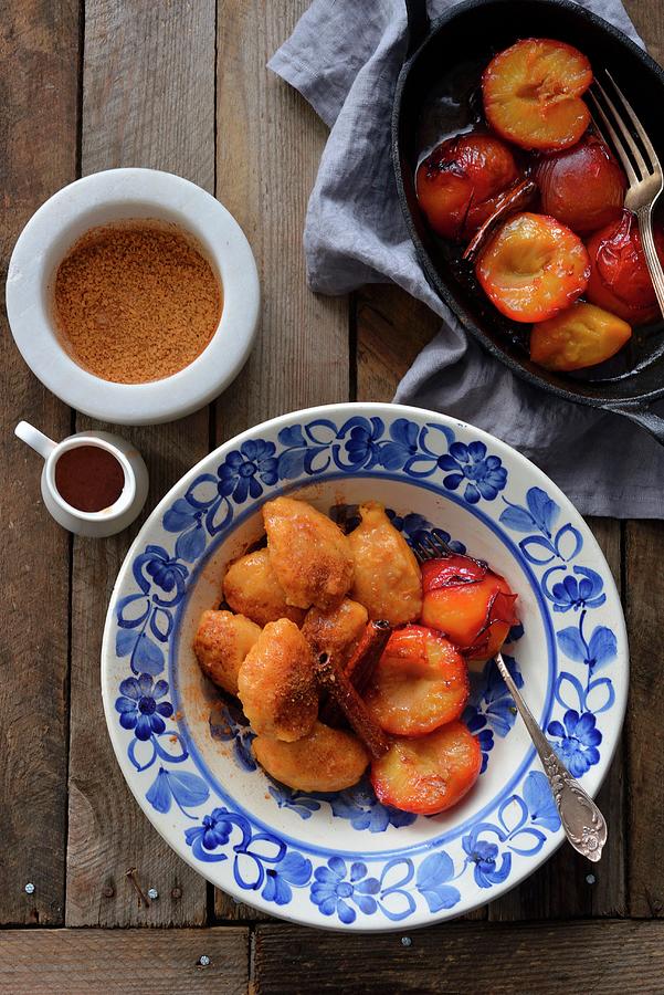 Sweet Potato Dumplings Served With Caramel Plums Photograph by Karolina Smyk