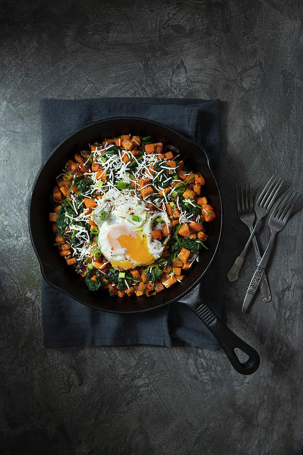 Sweet Potato Hash With Spinach, Smoked Paprika, Spring Onion, Garlic, Grated Cheese And Fried Egg Photograph by Magdalena Hendey