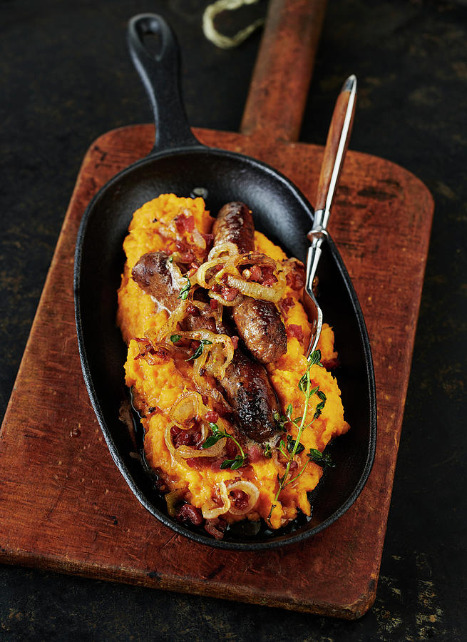 Sweet Potato Puree With Sausages And Roasted Onions Photograph by Stefan Schulte-ladbeck