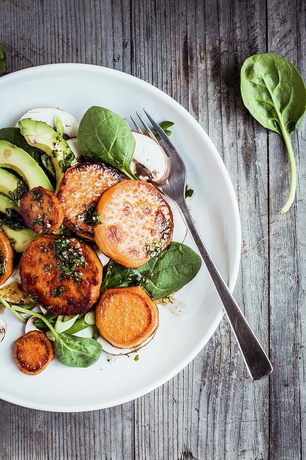 Sweet Potato Salad With Avocado And Baby Spinach Photograph by Simone Neufing