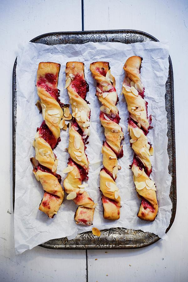 Sweet Puff Pastry Sticks With Jam On A Tray seen From Above Photograph by Sporrer/skowronek