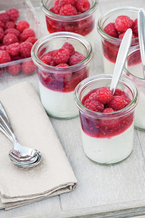 Sweetened Goats Cream Cheese With Raspberries In Glasses On A Tray Photograph by Jan Wischnewski
