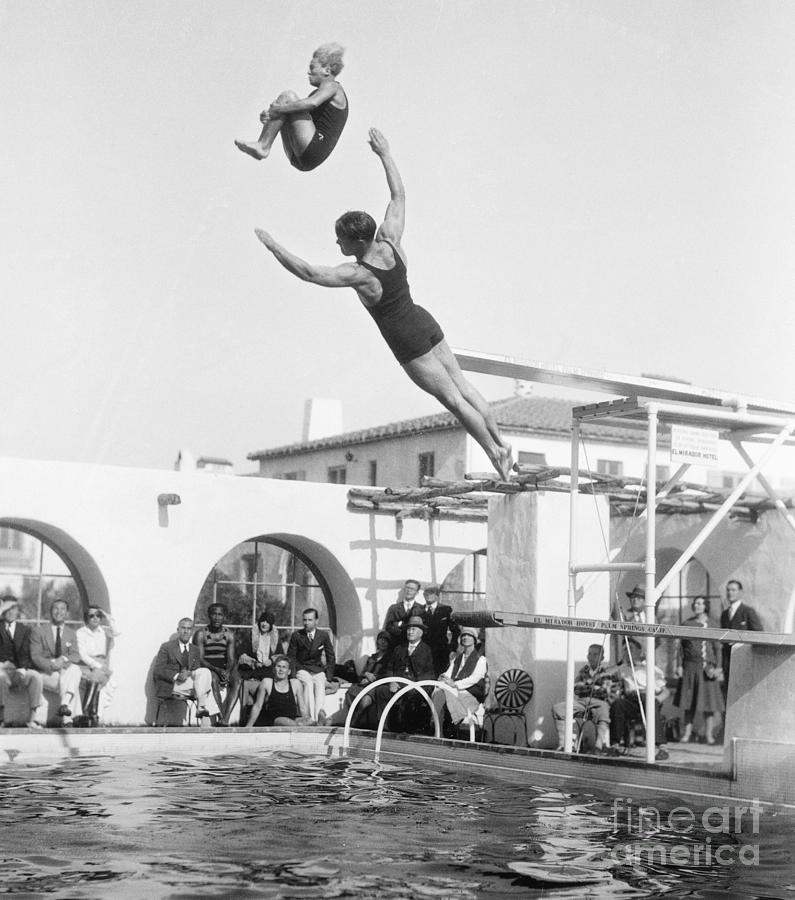 Swimmers Jumping Off The Diving Boards Photograph by Bettmann | Pixels
