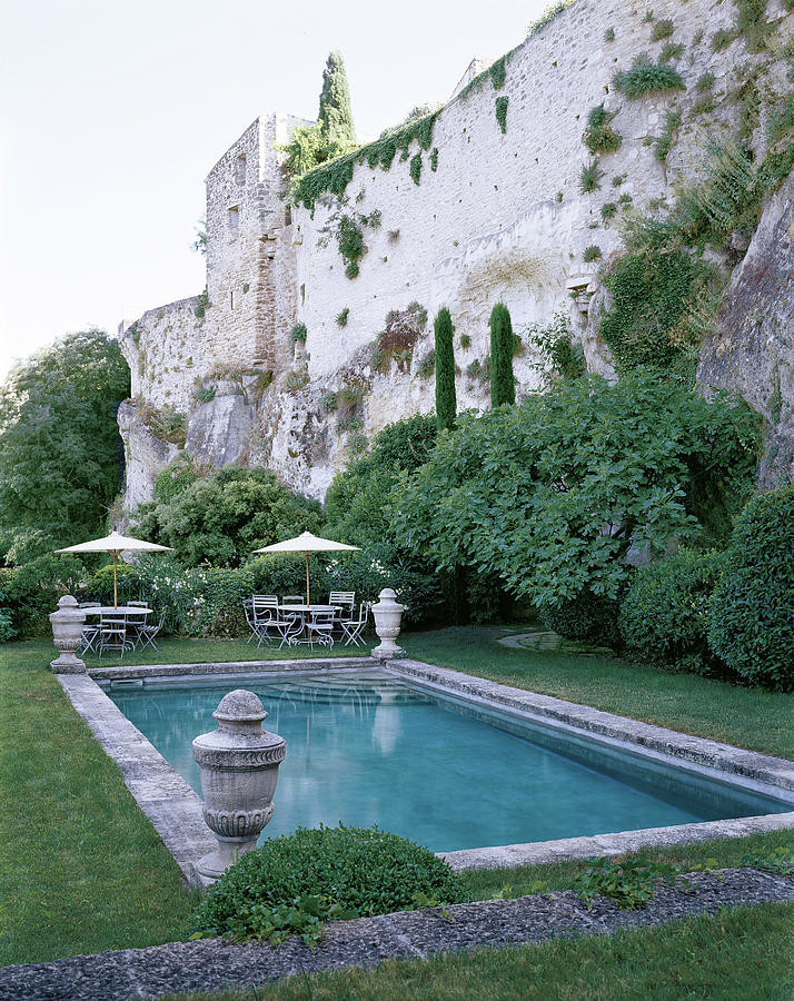Swimming Pool Beneath Ramparts Of A French Chateau Photograph by Marina Faust