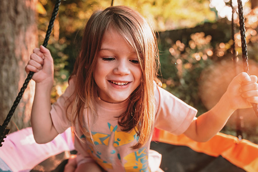 Swinging On Her Tree Swing At Sunset Photograph by Cavan Images Fine Swinging On Her Tree Swing At Sunset Photograph by Cavan Images Fine