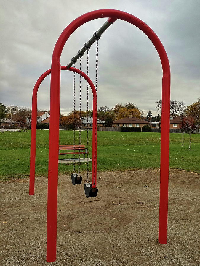 Swings Awaiting the Return of the Children Photograph by Boyd Carter
