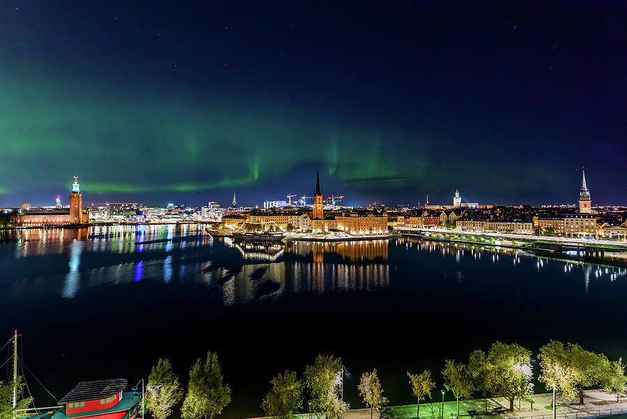 Aurora Borealis Photograph - Swirly Aurora Over Stockholm and Gamla Stan by Dejan Kostic Aurora Borealis Photograph - Swirly Aurora Over Stockholm and Gamla Stan by Dejan Kostic
