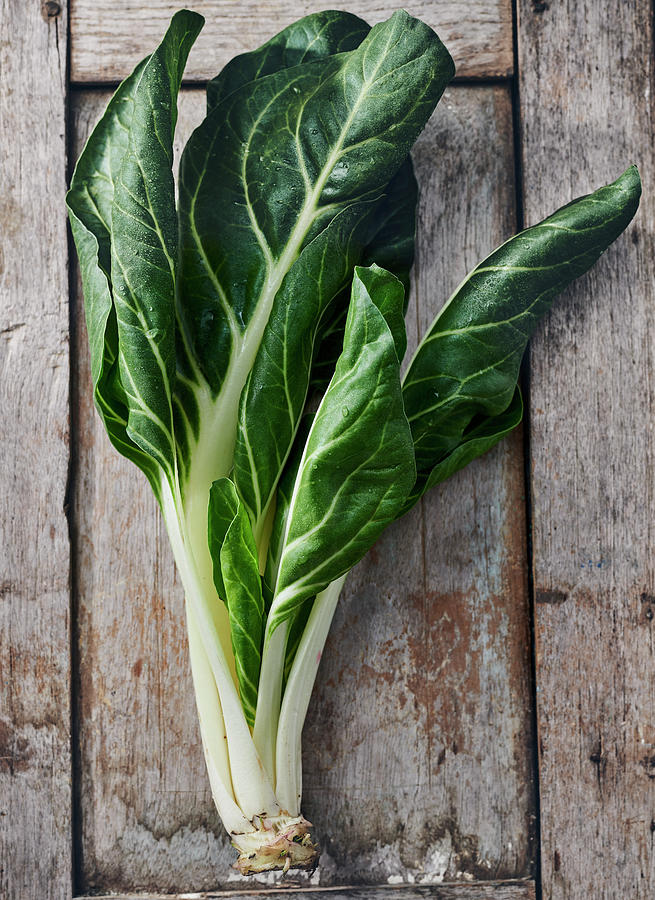 Swiss Chard On A Board Photograph by Stefan Schulte-ladbeck