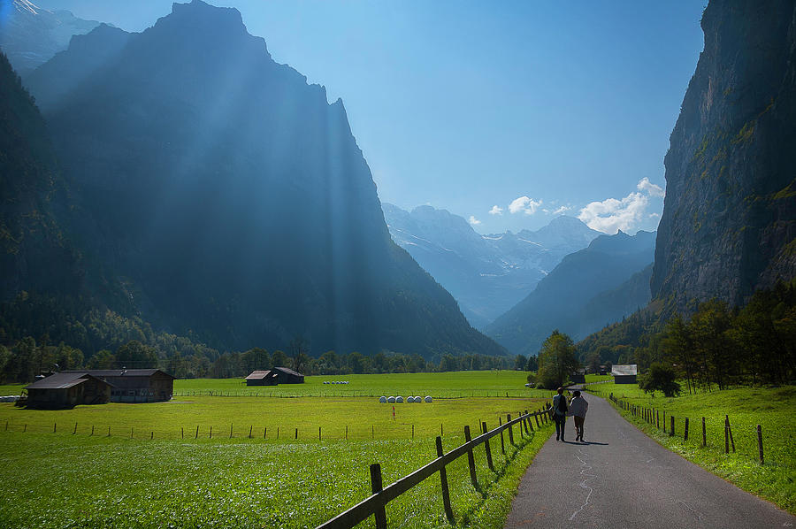 Swiss Hikers In Lauterbrunnen Switzerland Photograph by Owen Weber