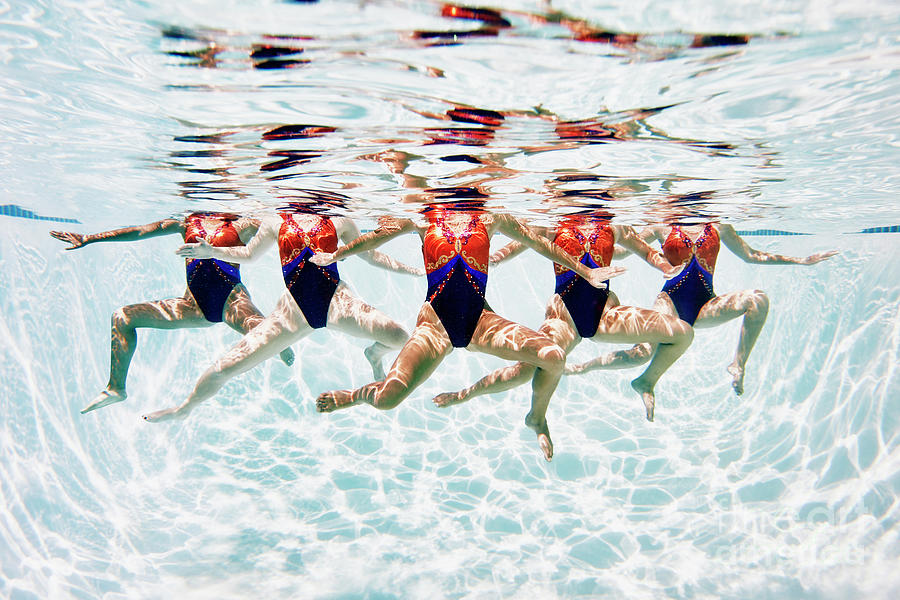 Synchronized Swim Team Treading Water Photograph by Thomas Barwick