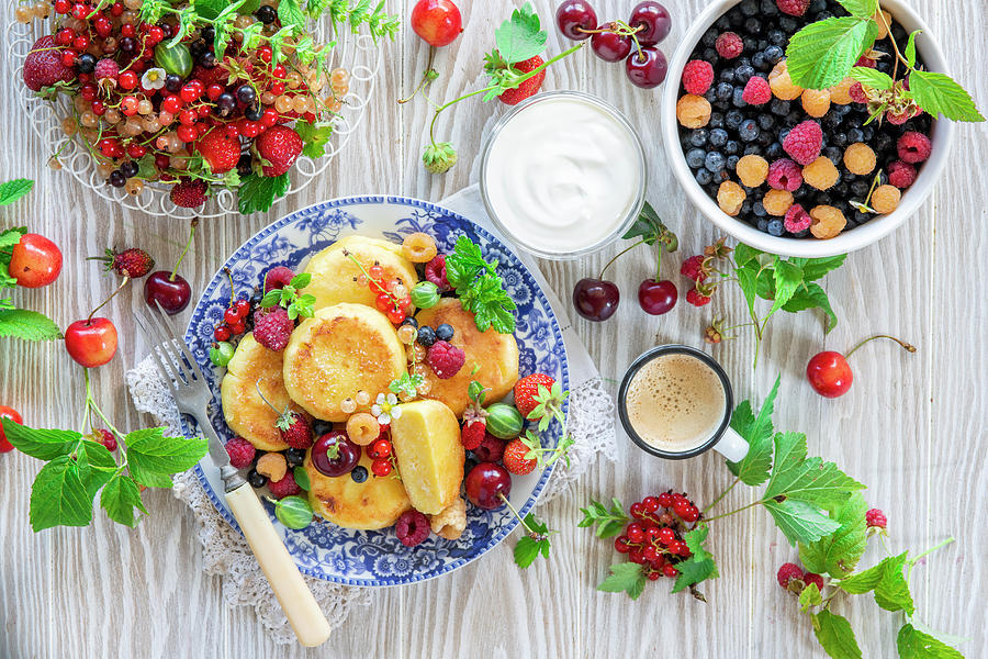 Syrniki cottage Cheese Pancakes With Fresh Berries Photograph by Irina Meliukh