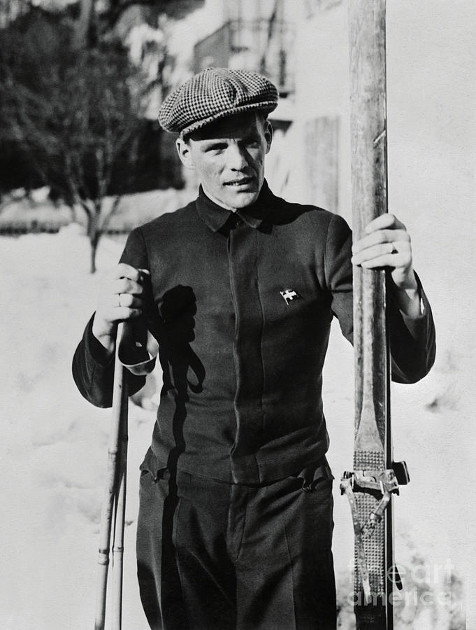 T. H. Haug Holding Skis Photograph by Bettmann