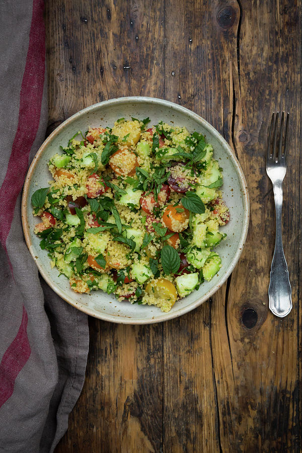Tabbouleh couscous Salad With Tomatoes, Cucumber, Red Onions, Parsley And Mint Photograph by Larissa Veronesi